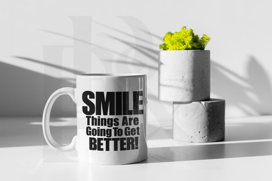 Image of the "Smile, Things Are Going to Get Better" mug available in 11oz and 15oz, featuring a bright, uplifting design with a motivational message.